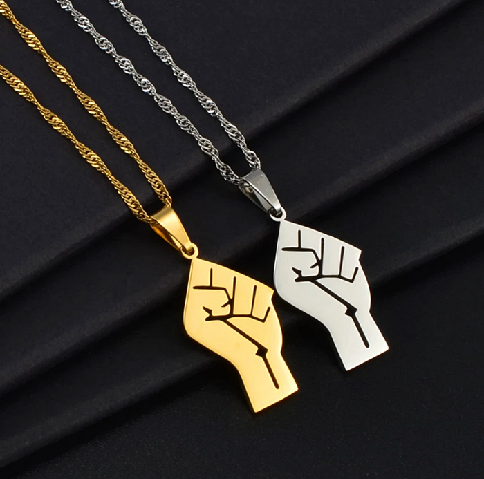 Raised fist pendant discount