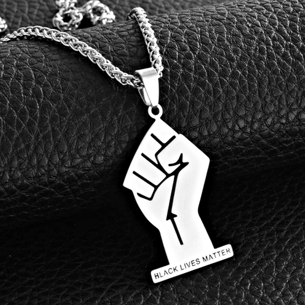 Raised deals fist necklace